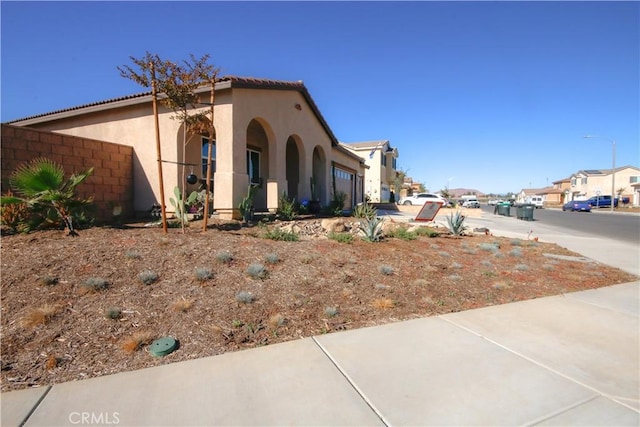 view of home's exterior with a garage