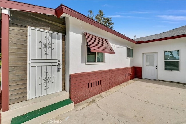 view of home's exterior featuring a patio area