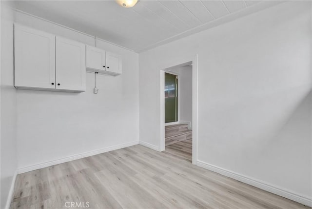 unfurnished room featuring light hardwood / wood-style flooring