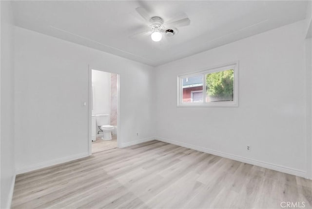 unfurnished room featuring ceiling fan and light hardwood / wood-style flooring