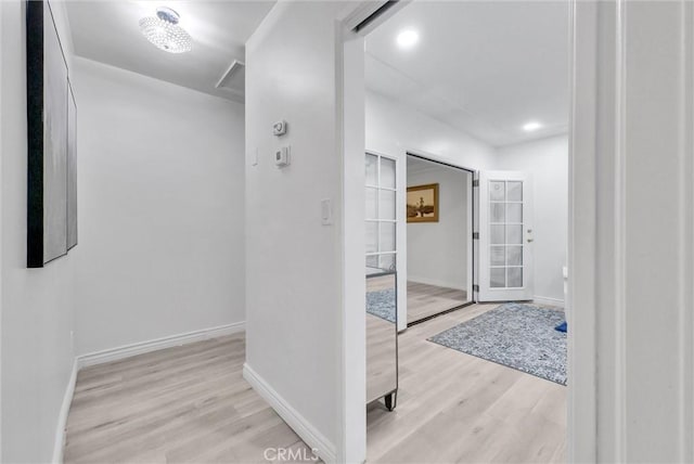 bathroom with hardwood / wood-style flooring