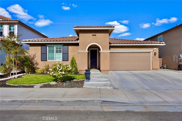 view of front of property with a garage