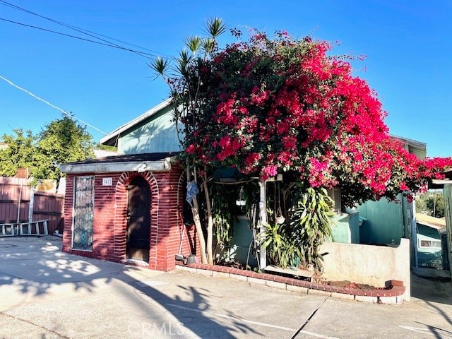 view of front of property with a patio