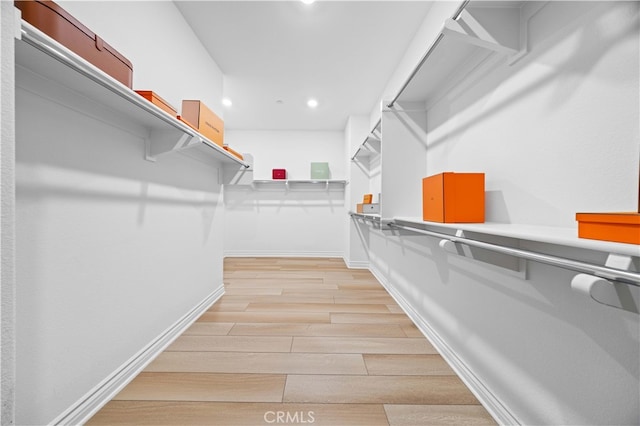 spacious closet with light wood-type flooring