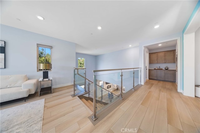 hallway featuring light hardwood / wood-style flooring