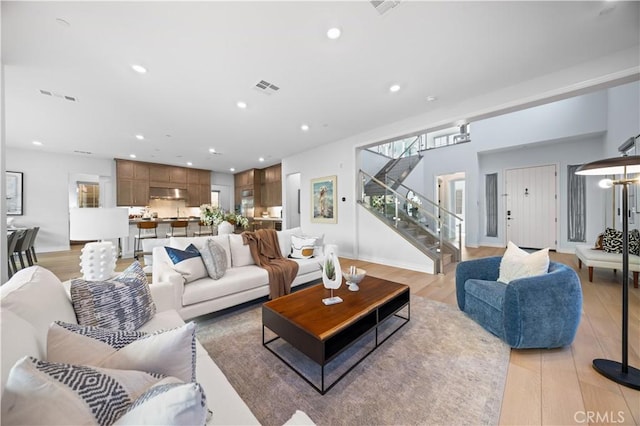 living room with light hardwood / wood-style floors