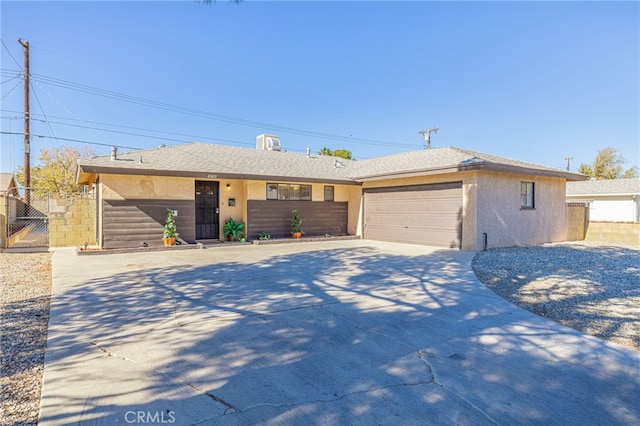 single story home featuring a garage