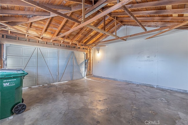 garage featuring wooden ceiling