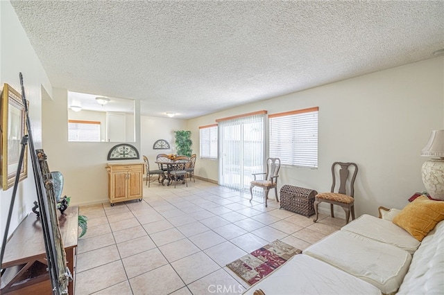 tiled living room with a textured ceiling