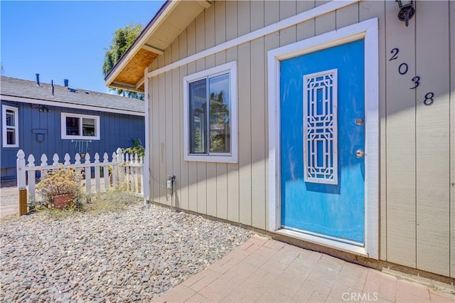 entrance to property with a patio