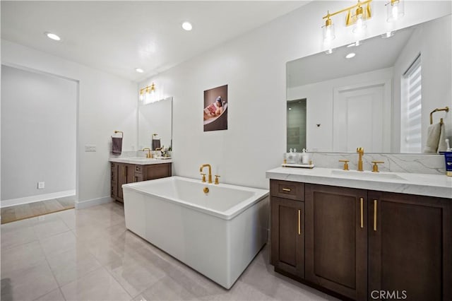 bathroom featuring a bathtub and vanity