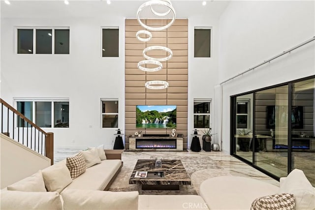 living room featuring a high ceiling