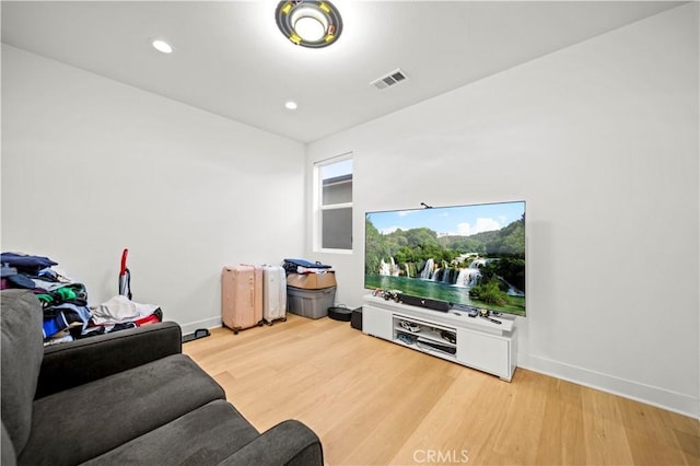 living room with hardwood / wood-style flooring