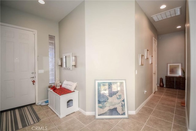 foyer featuring light tile patterned flooring