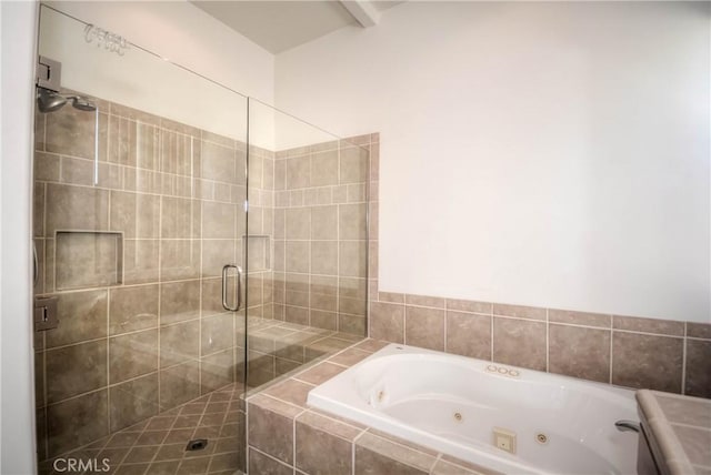 bathroom with shower with separate bathtub