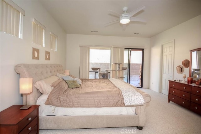 bedroom featuring access to outside, ceiling fan, and light colored carpet