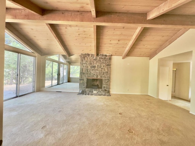 unfurnished living room with wooden ceiling, carpet, a fireplace, and lofted ceiling with beams