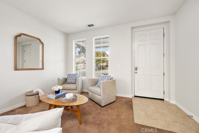 living room featuring light tile patterned flooring