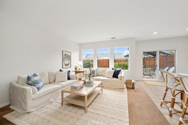 living room with light tile patterned floors