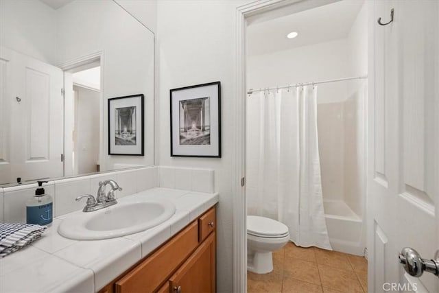 full bathroom featuring tile patterned floors, vanity, shower / tub combo, and toilet