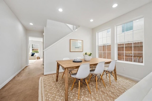 view of carpeted dining space