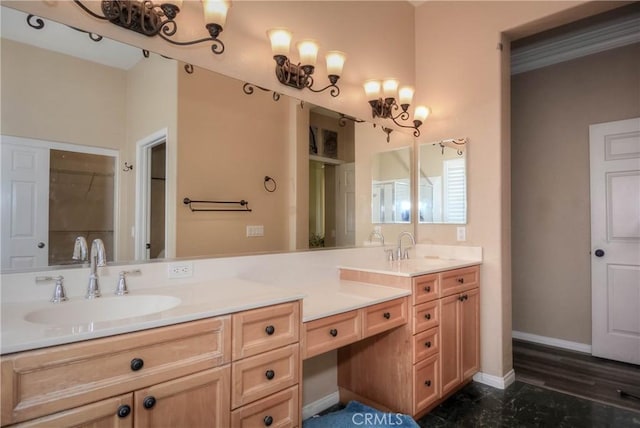 bathroom with vanity and hardwood / wood-style flooring