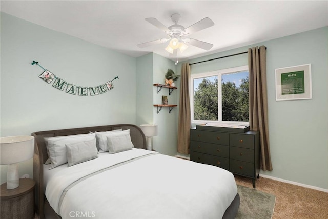 carpeted bedroom with ceiling fan