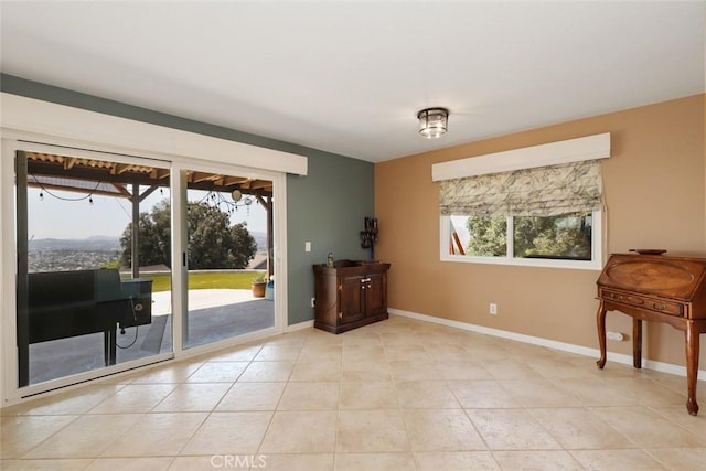 entryway featuring light tile patterned flooring