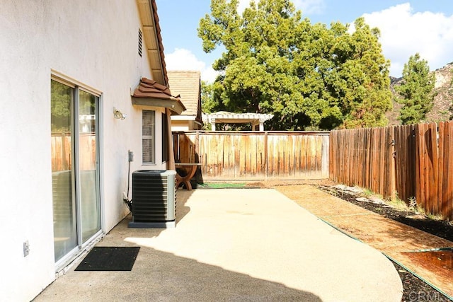 view of patio with cooling unit