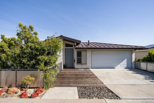 view of front of home with a garage