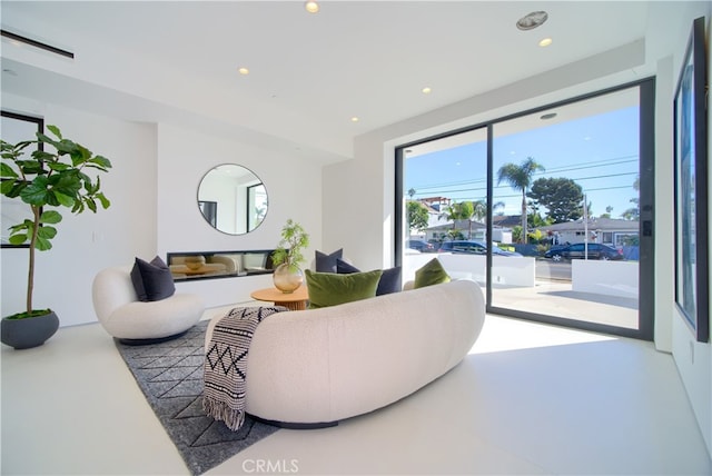 living room featuring concrete floors