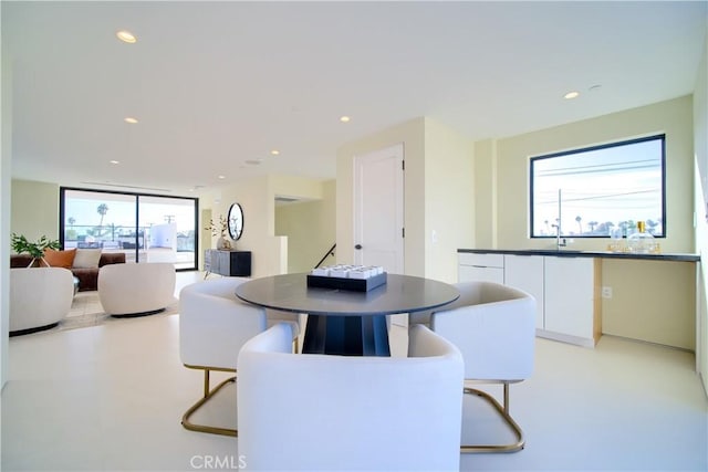 dining room with recessed lighting