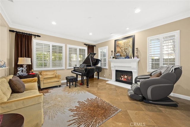 living area featuring crown molding and a healthy amount of sunlight