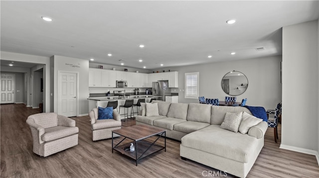 living room featuring light hardwood / wood-style flooring