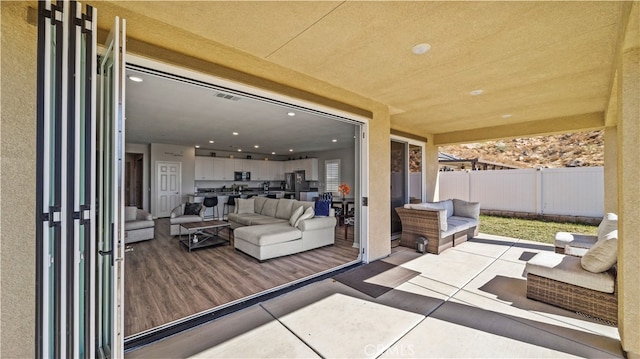 view of patio / terrace featuring an outdoor hangout area