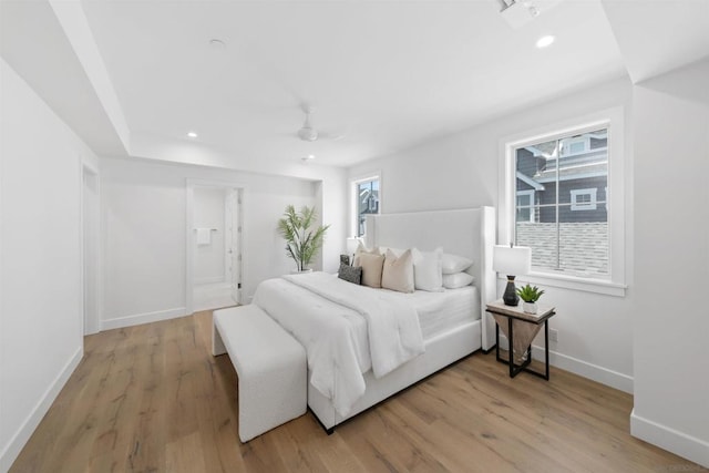 bedroom featuring ceiling fan and light wood-type flooring