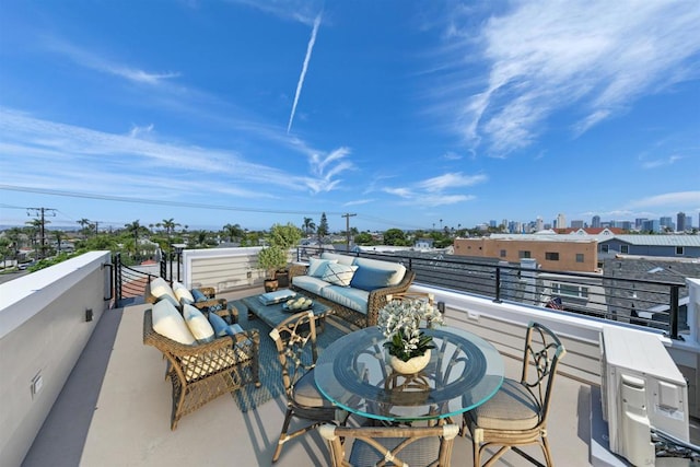 view of patio / terrace with a balcony