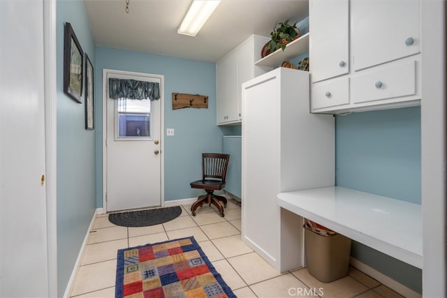 interior space featuring light tile patterned flooring