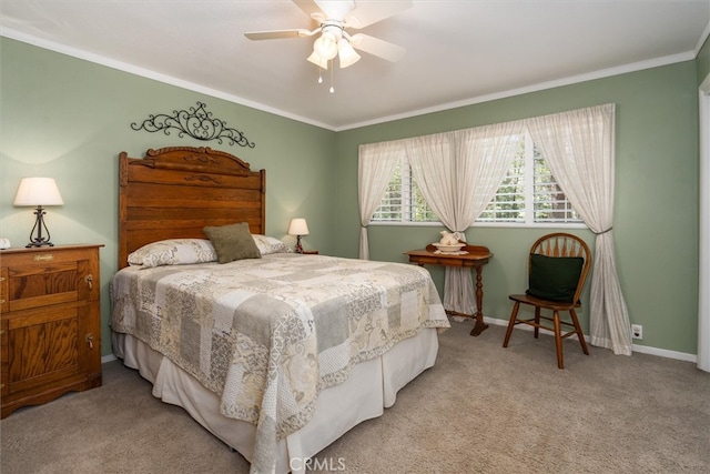 bedroom with light carpet, ornamental molding, and ceiling fan