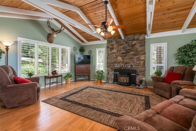 living room featuring wood ceiling, beamed ceiling, wood-type flooring, high vaulted ceiling, and ceiling fan