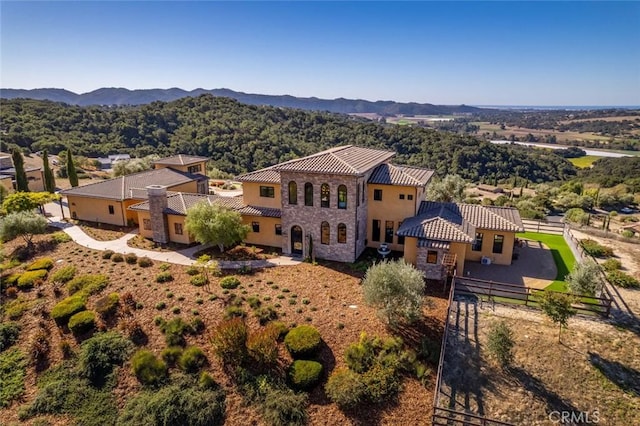 drone / aerial view featuring a mountain view