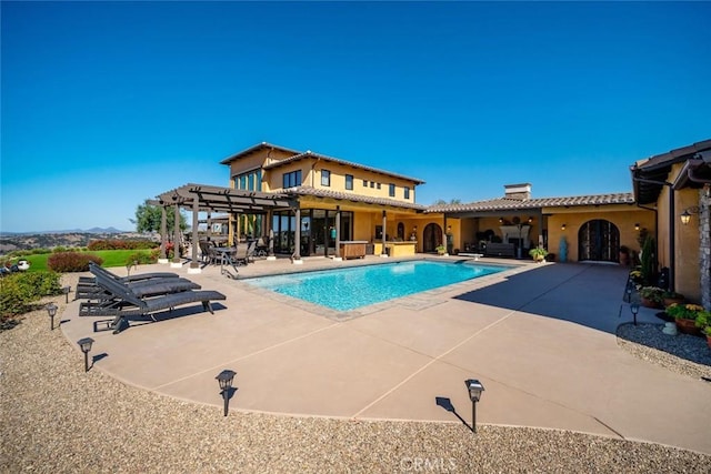 view of pool featuring a patio area