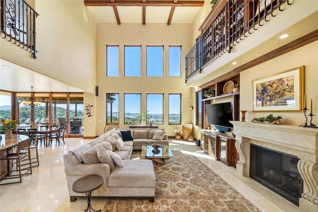 tiled living room featuring an inviting chandelier, a towering ceiling, and beamed ceiling