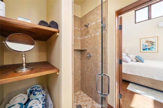 bathroom featuring an enclosed shower