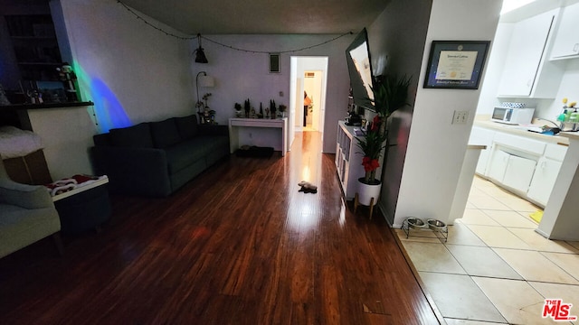 living room with light hardwood / wood-style floors