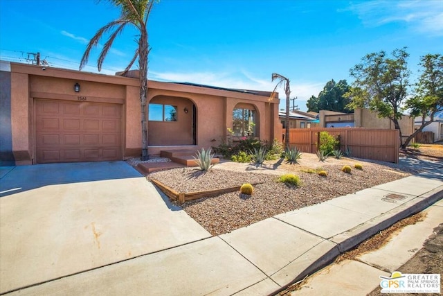 view of front of home featuring a garage