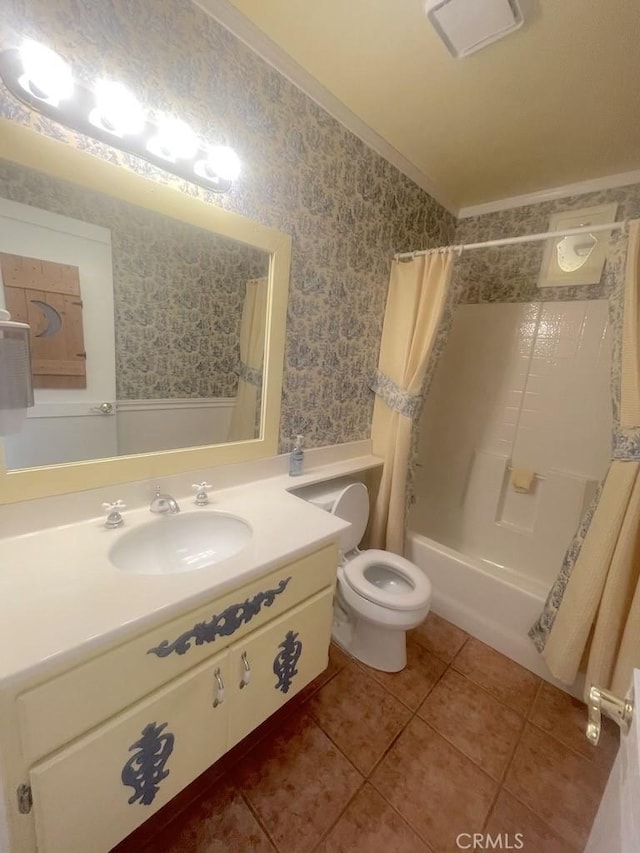 full bathroom featuring vanity, crown molding, tile patterned flooring, toilet, and shower / tub combo with curtain