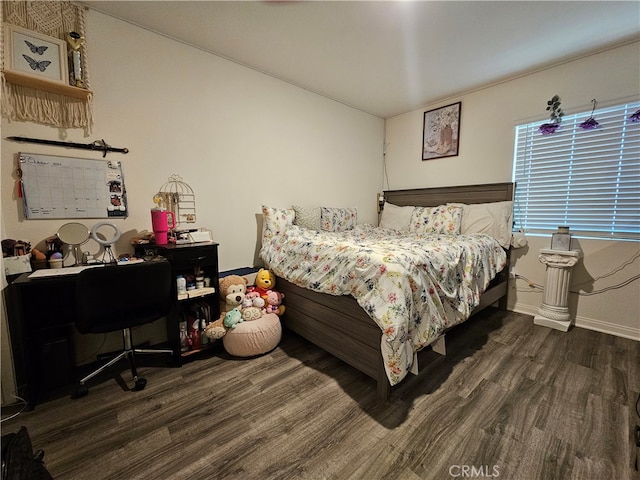 bedroom featuring dark hardwood / wood-style floors