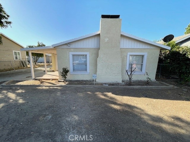 rear view of house featuring a patio area