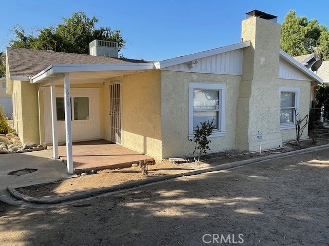 rear view of property with a patio